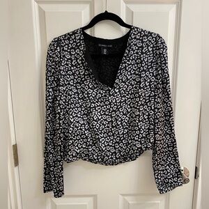 Sincerely Jules Leopard Print V-Neck Blouse